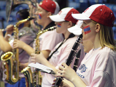 Stitched into the brims of their hats it says, `Go Crazy or Go Home.`
