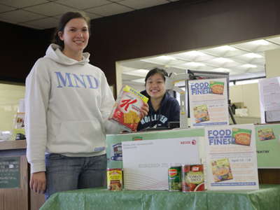 Another totally unposed scene at the Library Circulation Desk (see August 27, 2008).