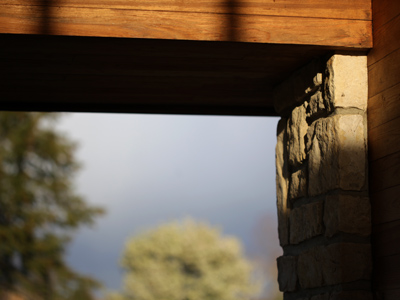 Inside the shelter:  sunset behind, clouds ahead, rain above.