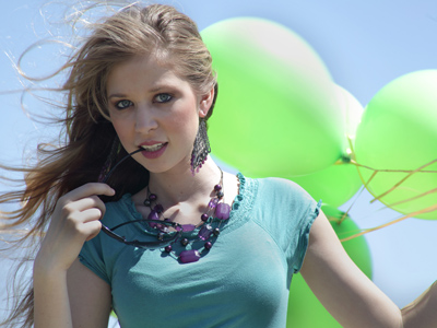 It was awfully windy to be holding a bunch of balloons.