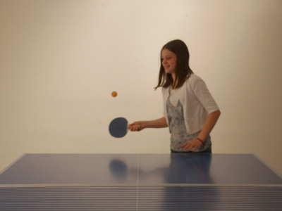 It`s hard to play ping-pong while taking pictures, and vice versa.