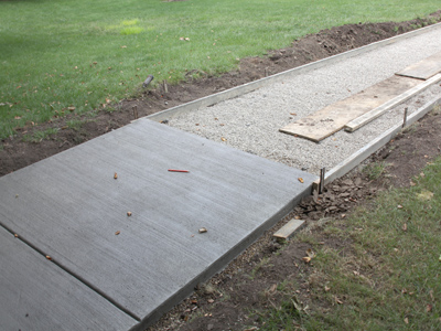 In the old days, students walked where the sidewalks were and kept off the grass.  Now they walk through the grass, creating a muddy path, until we build sidewalks for them.