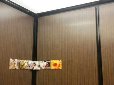 My clever sign to promote my photo exhibition might not last long in a busy elevator.