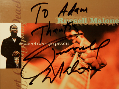 Compact discs may be a dying format, but I`d like to see a musician autograph a digital download.