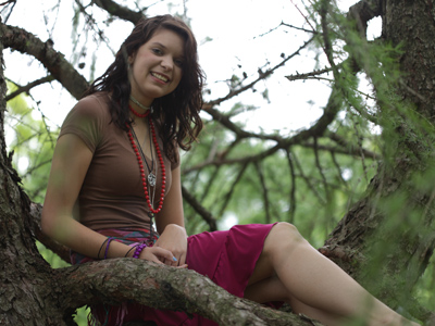 Merry Mary sits in the old pine tree, merry merry queen of the bush is she.