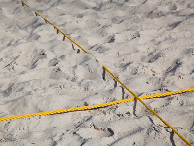 The building being demolished in my photo of August 4, 2008, has given way to a new sand volleyball court.