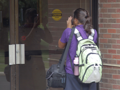 Don`t tell me:  Photography 101 student working on reflections assignment.