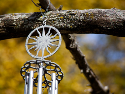 On a neighbor`s porch wind chimes annoy me, but in the woods they quietly complement the sounds of nature.
