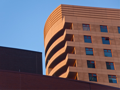 From a window of downtown Dayton`s most expensive residence dangles a cheap TV antenna.