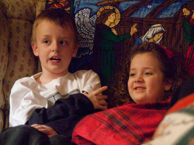 Tiny tots, with their eyes all aglow.