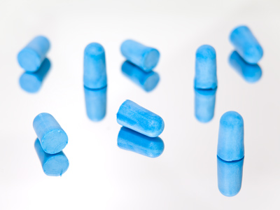 I always carry earplugs, in case I`m photographing screaming cheerleaders, racing cars or boring lecturers.