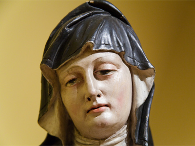 Adrienne is crestfallen when another woman arrives wearing the same wimple.