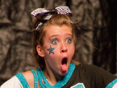 Most of the cheerleaders just wore excessive makeup on their faces, but this team also had stars upon thars.