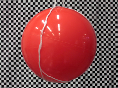 The ball is in focus, the background is clear.