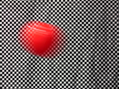 The ball is moving and blurry.