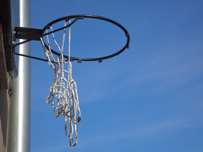 Players from the Ohio School for the Invisible cut down the net after a recent tournament victory.  It`s very hard to play defense against the Ohio School for the Invisible.