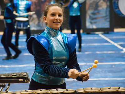 The nice thing about percussion is that the performers play live music, unlike color guard which uses recordings.