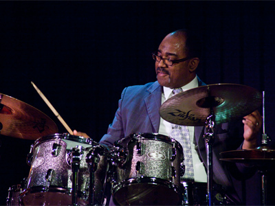 At the start of the concert, there were five people on stage and five people in the audience.