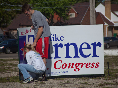 My candidate has a bigger sign than yours.