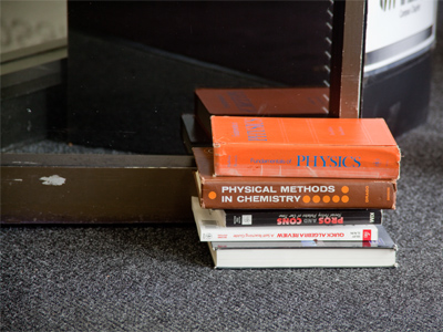 I can think of no better use for science and math texts than to hold open a door.  Just don`t use any literature books.
