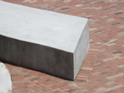 What this bench lacks in comfort it makes up for in permanence.  See its construction on March 23, 2010.