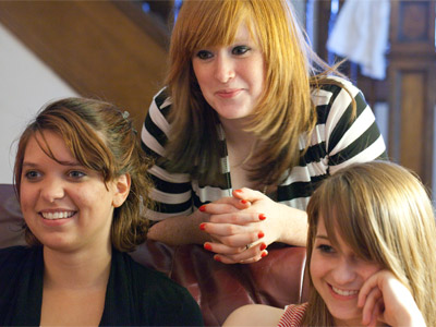 Tonight I had the fun experience of showing these three girls the pictures I took of them on July 17 (see above).