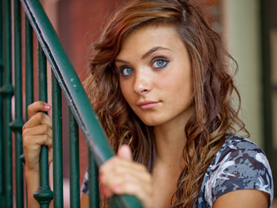 She was very reluctant to smile, but seemed to get by pretty well with this wide-eyed, smoldering stare.