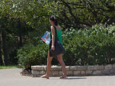 Someone trying to look like a student is actually handing out Walmart flyers around campus during lunch today.