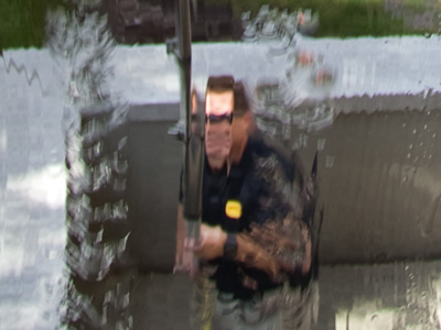 Window washer working hard.