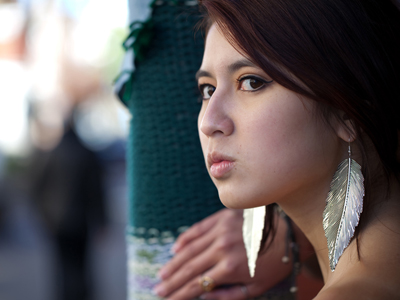 Gazing out of a doorway on Fifth Street.  I asked her boyfriend to walk down the sidewalk in the distance.