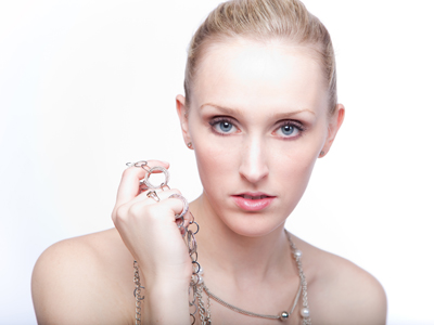 `My hair only does one thing,` she said.  But with the skillful use a rubber band, an entirely new look can be achieved.