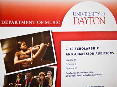 I`m sure you remember this photo from March 22, 2010.  Coincidentally, I noticed this sign just as the violinist was walking past.  She was surprised to see herself on it.