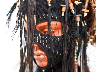 This piece is part of a series inspired by Paul Laurence Dunbar`s most famous poem `We Wear the Mask.`