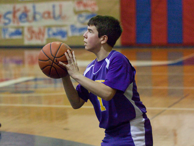 With none of his teammates open for a pass, he is forced to reluctantly shoot the ball.