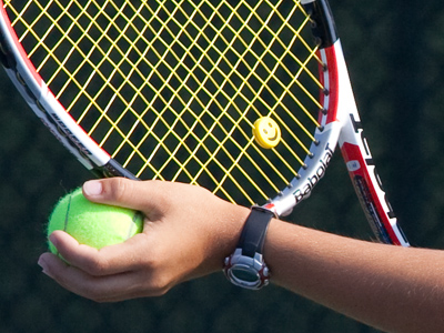 Today I also learned that tennis players, male and female, pros and kids, put little cutesie things on their rackets.