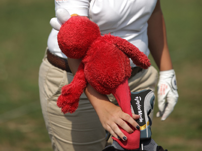 Elmo protects the clubs.