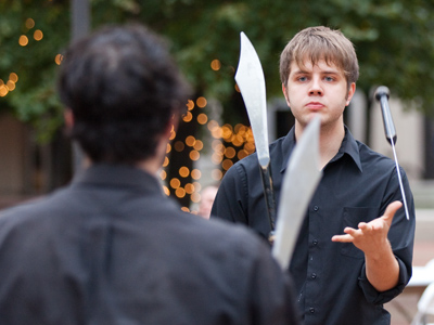 When juggling razor-sharp knives, you certainly don`t want to have a photographer standing nearby distracting you.