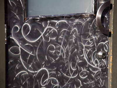 Oops!  Shouldn`t have used a Brillo pad to clean the door.