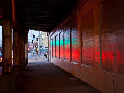 Traffic light green, tail lights red.