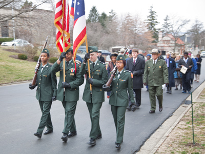 This morning, 106 years after Dunbar`s death, a small crowd gathered at his gravesite in Woodland Cemetery.