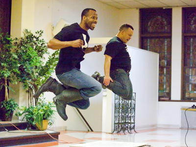 The gum boots are decorated with bottle caps as a reminder of the chains around the ankles of the workers.