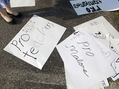 After twelve successful years as principal, Dr. Malone was facing reassignment to a new position in the district office.  The outcry from the community was immediate and vocal.