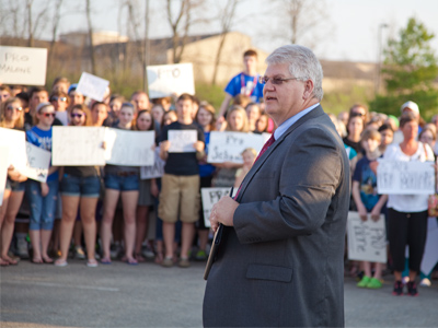 The mood was tense, but all parties were respectful as board president Scott Anderson addressed the crowd.  Ron Malone is to continue as high school principal.