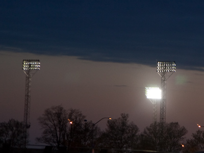 I`m in my winter coat, and some team is playing outside.