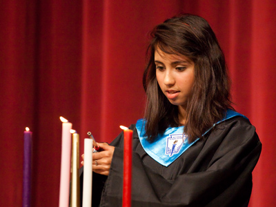 Lighting a candle in front of a large crowd SOUNDS easy.