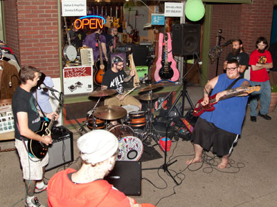 Oregon District sidewalk:  rock concert.