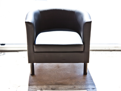 On the sunny side of the seat.