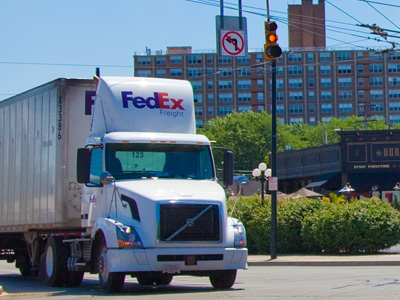 Traffic lights don`t apply to FedEx trucks.  What do you think the Ex stands for?