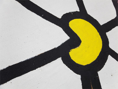 A bit of paint makes a dull sidewalk look much better.