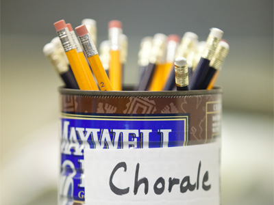 Pencils are necessary because choir directors always make changes to what`s written in the music.